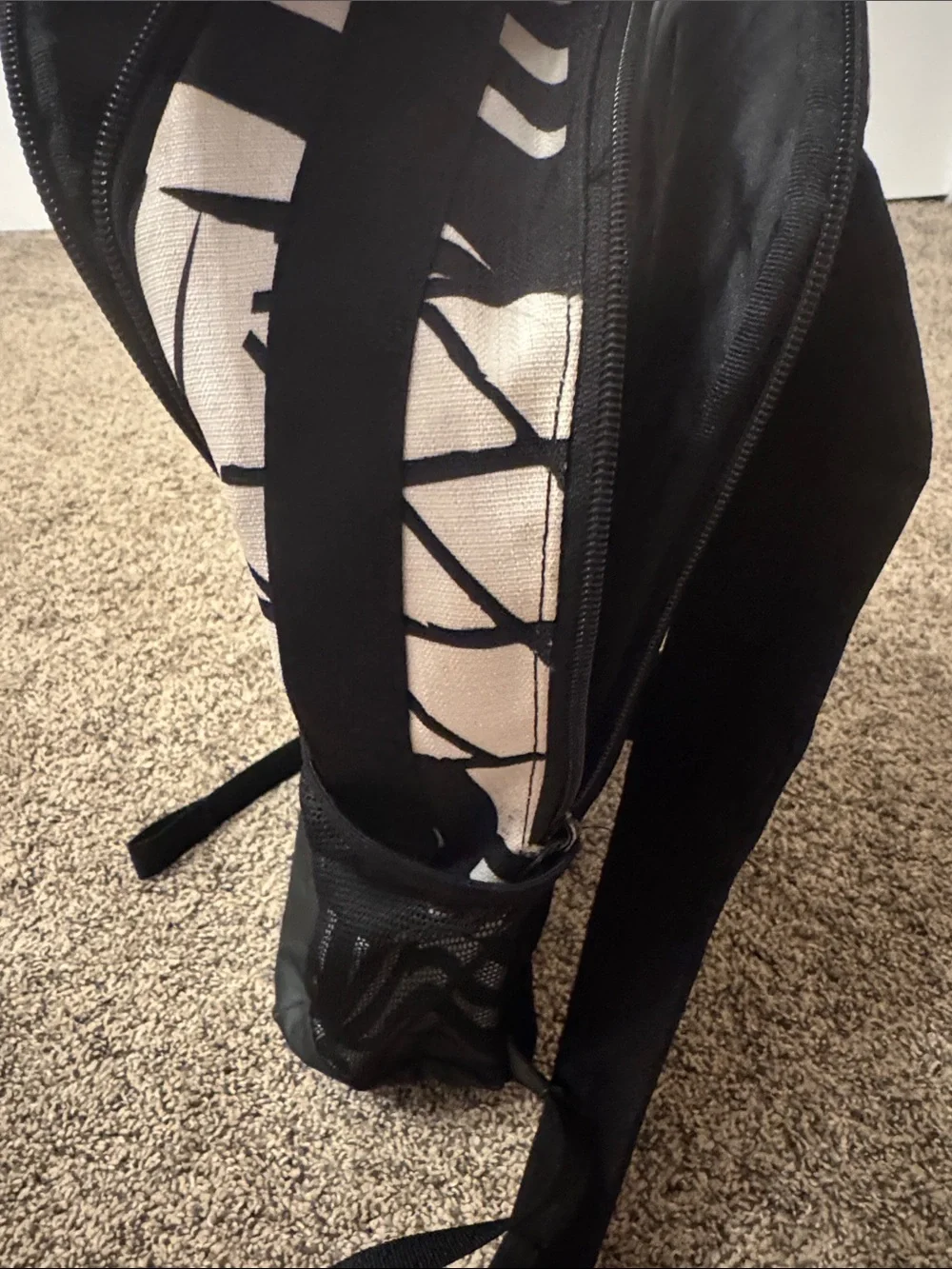 Nike Black & White Backpack with Orange Swoosh
